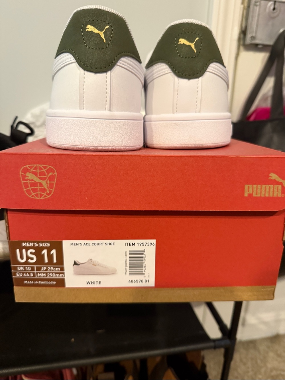 Puma White Sneakers with Olive Green Heel and Gold Logo